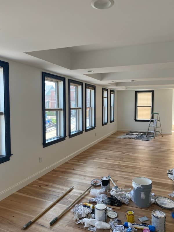 Commercial space with white walls and wood accent wall in Seabrook, NH