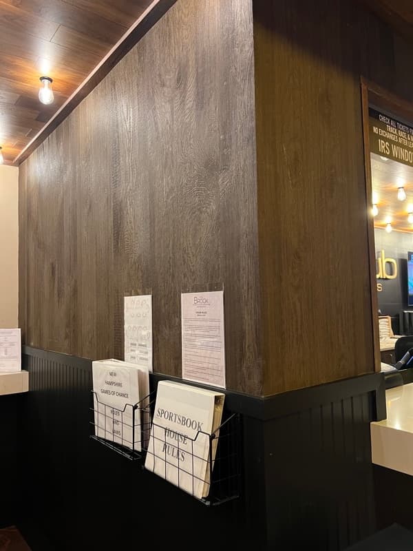 Wood-look wall covering at a commercial reception counter in Seabrook, NH